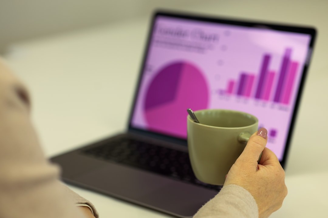 Social media analytics dashboard showing engagement metrics on a laptop screen