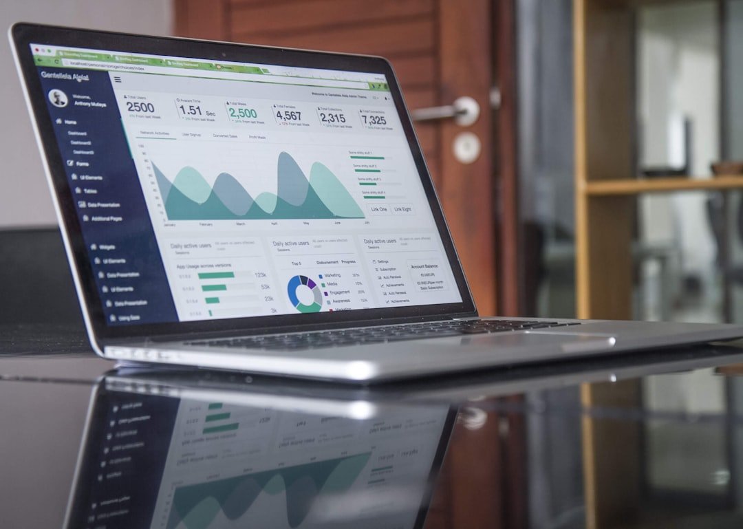 Entrepreneur reviewing hidden operational costs and accounting software on a laptop