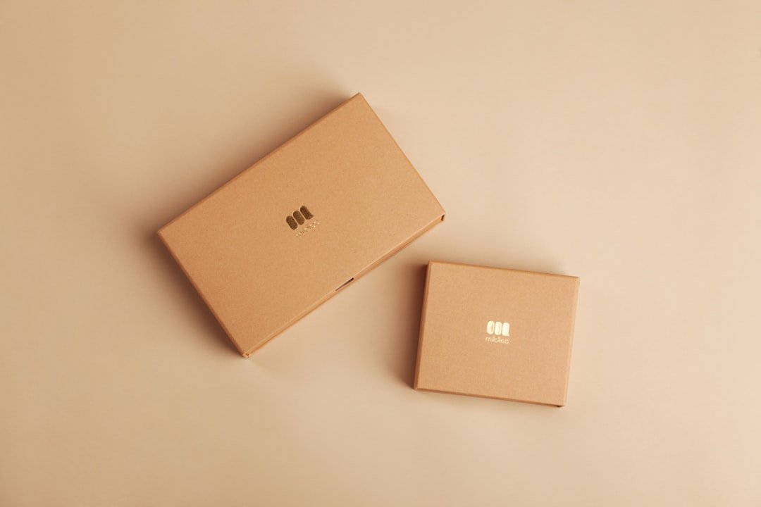 Customer unboxing a beautifully packaged e-commerce order — a key brand storytelling moment